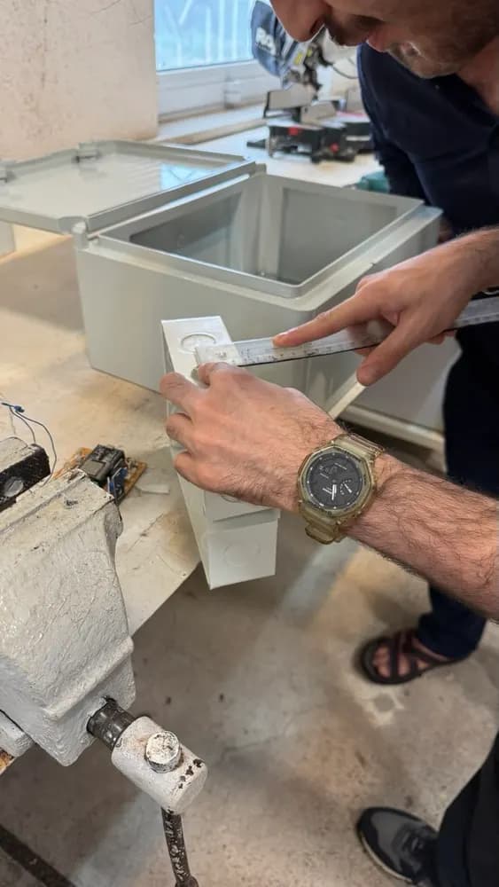 Preparing the waterproof box, and the socket, fuse and cable for a safe connection to mains power